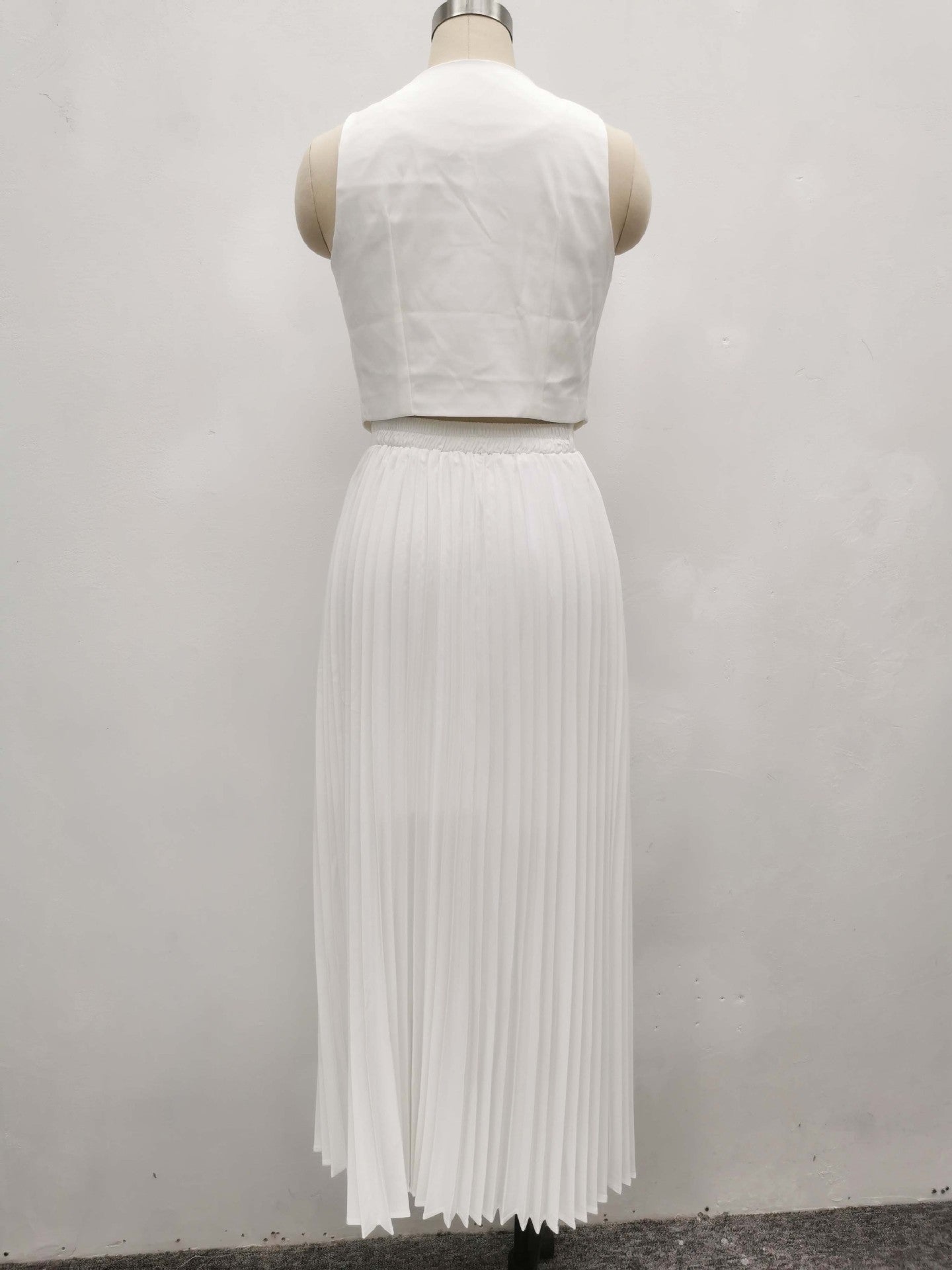 Fitted Vest and Pleated Mini Skirt Set