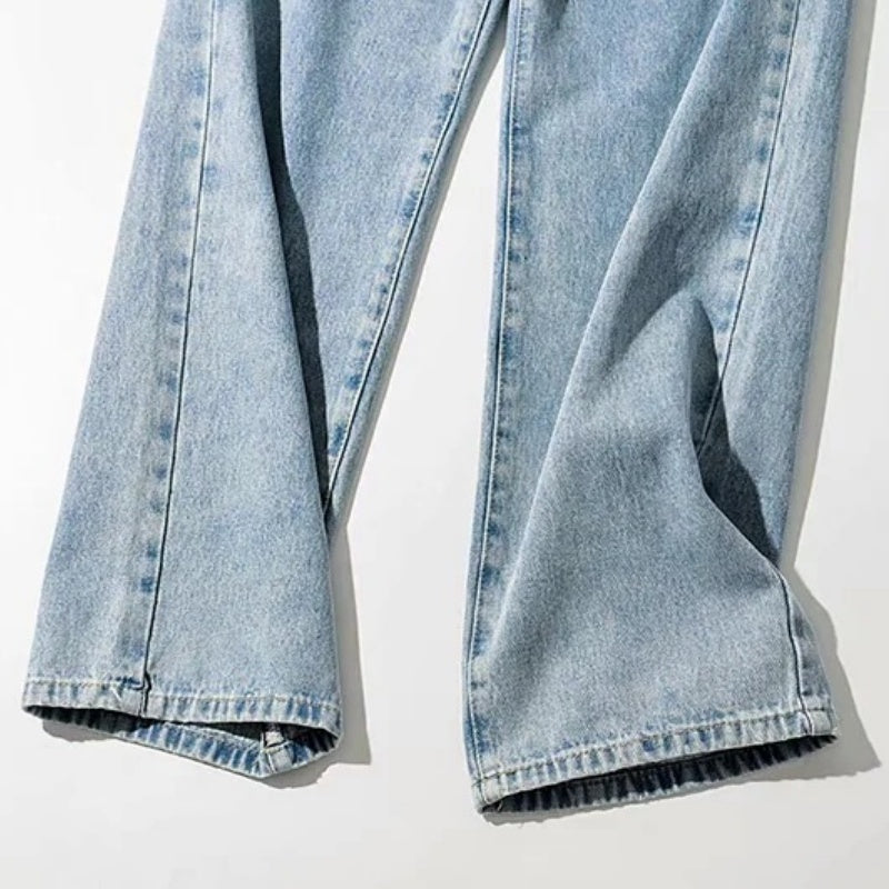 High-Rise Asymmetrical Crossover Jeans