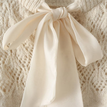 Knit Sweater with Bow Accent